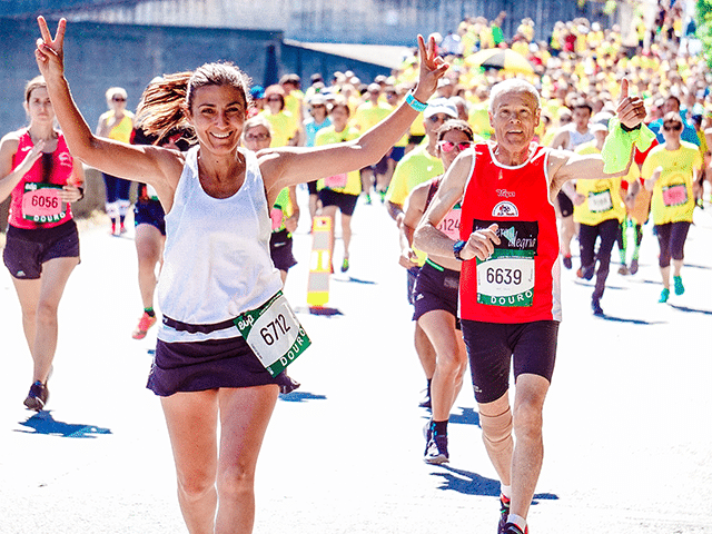 woman into health and wellness running a marathon